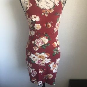 NWOT floral mid length body con dress. Size small